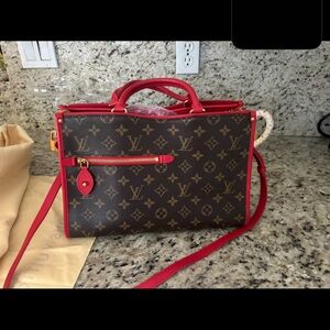 Louis Vuitton Brown Monogram Bag with Red Details